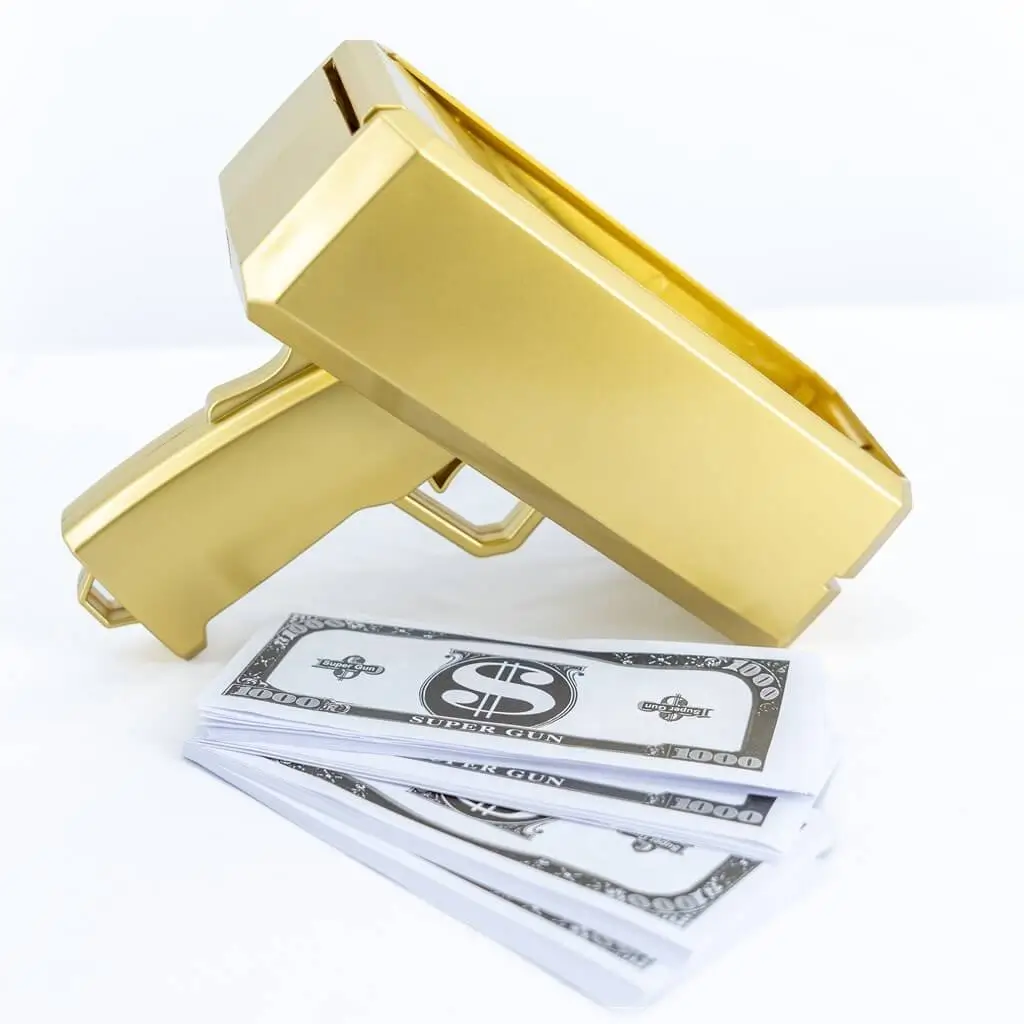 Seddelpistol - guldfarve - 100 falske pengesedler medfølger